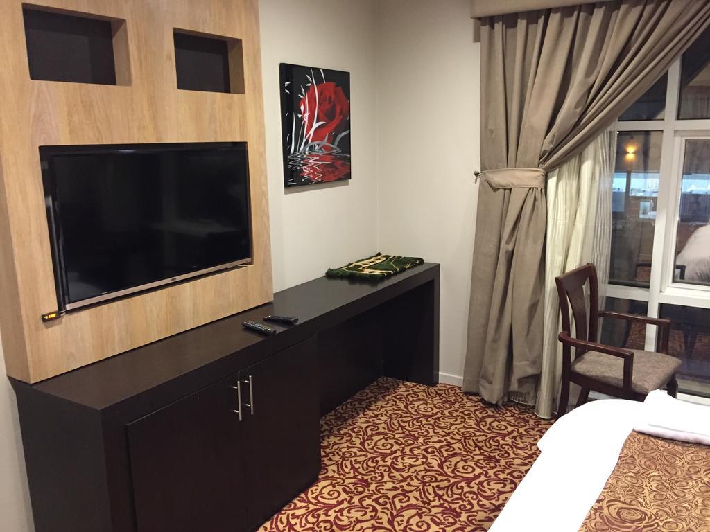 Ashbonh Hotel Suites Rijád Pokoj fotografie